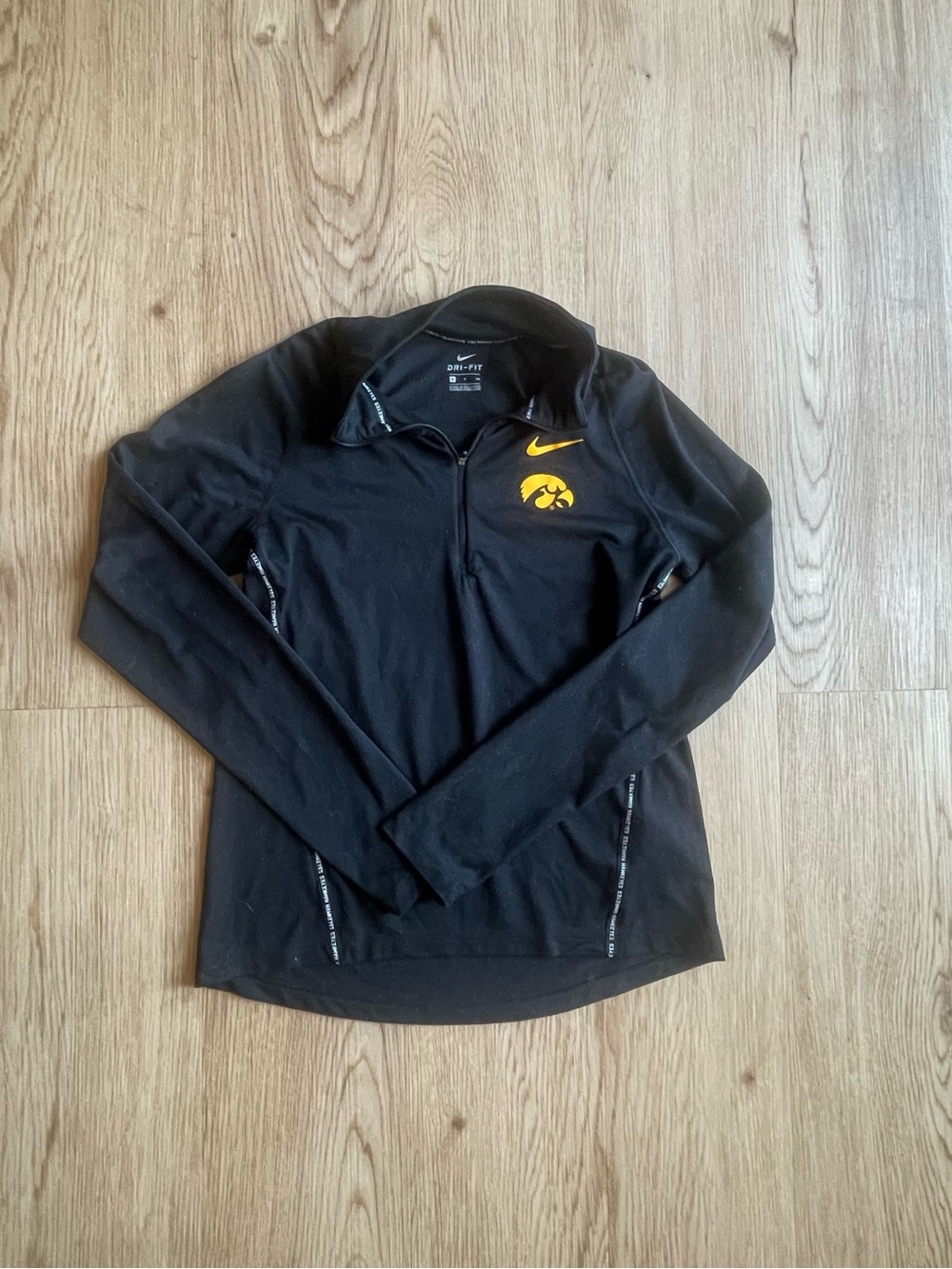 Nike Black Quarter-Zip Performance Pullover with Yellow Hawkeye Logo